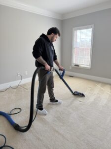 Owner of Poseidon carpet and tile cleaning based out of new jersey performing a carpet cleaning service