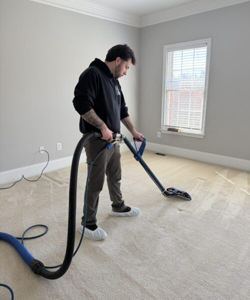 Owner of Poseidon carpet and tile cleaning based out of new jersey performing a carpet cleaning service